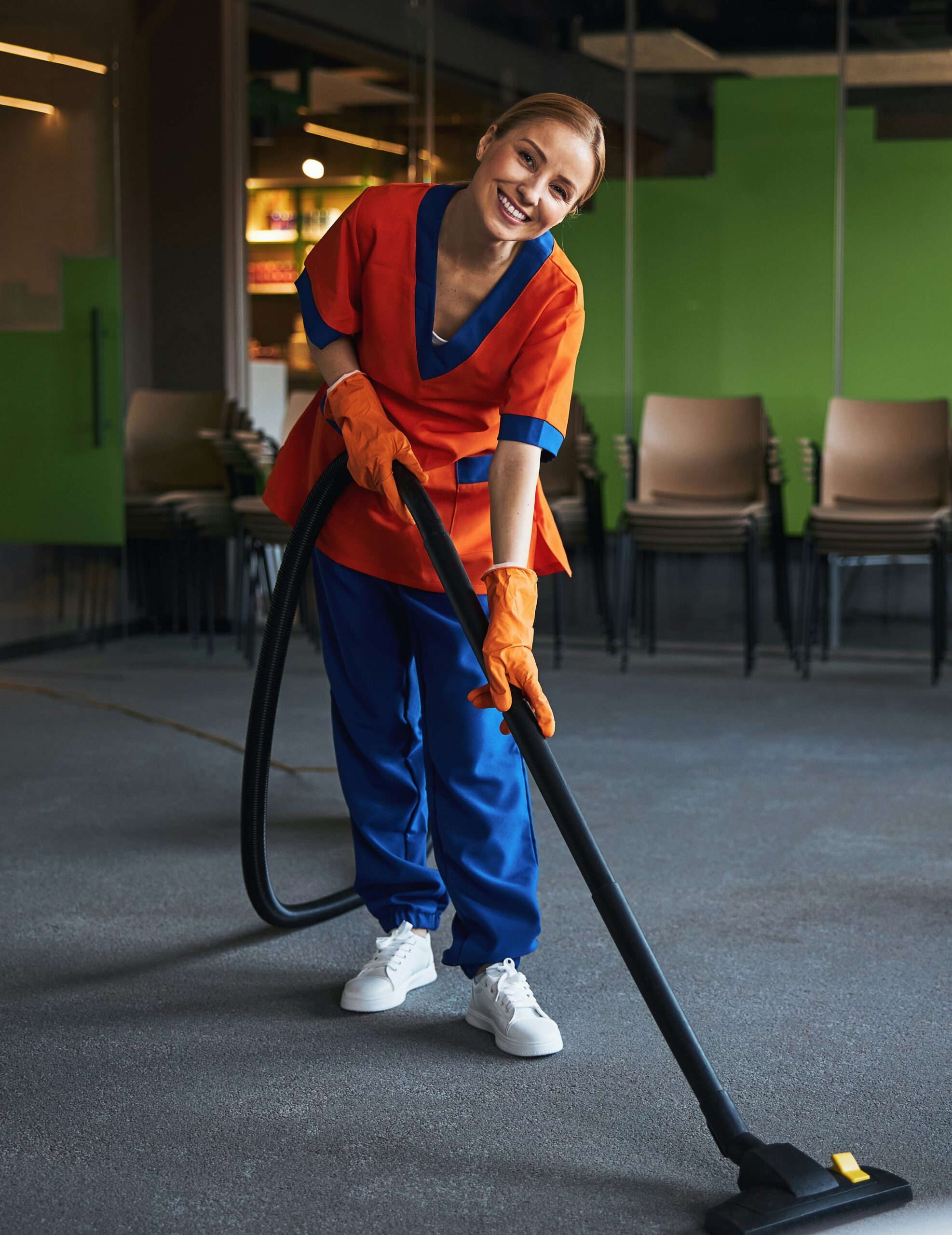 A young lady cleaning {{brizy_dc_image_alt imageSrc=